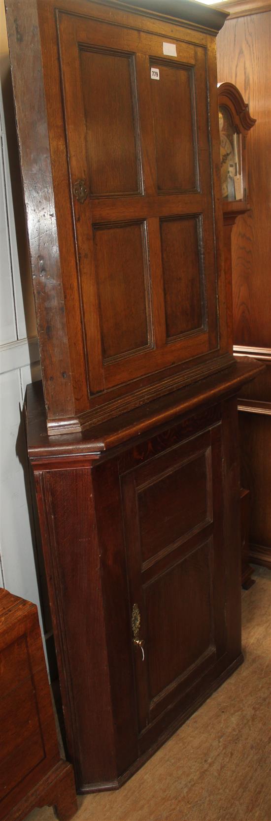Panelled oak corner cupboard
